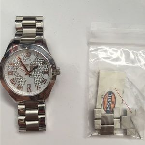 silver and rose gold Michael Kors watch