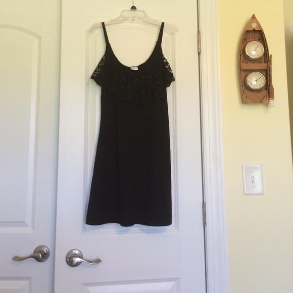 Black cover-up with lace ruffle at top