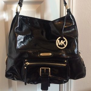 MK black patent and gold purse