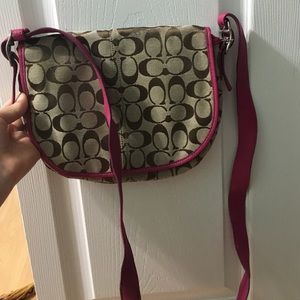 Pink trim coach cross body purse