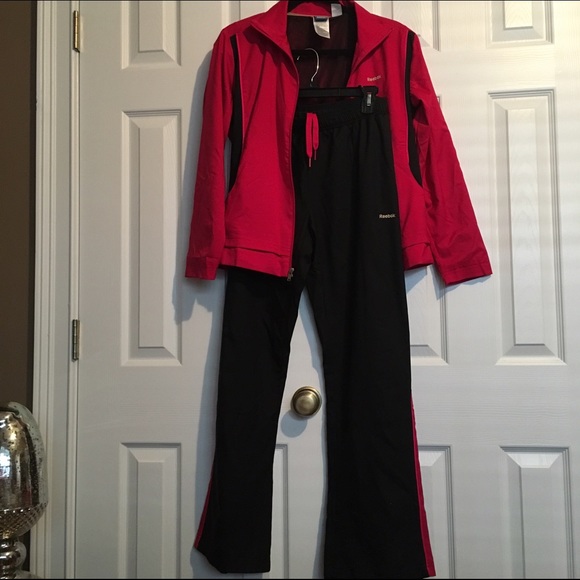 NWOT Reebok pink/black track suit.Final price drop