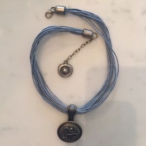 Leather necklace with silver pendant