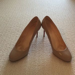 Christian Louboutin nude patent pumps