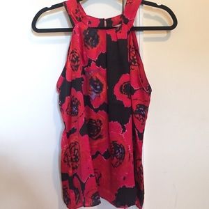 Red rose and black tank