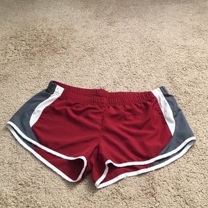Maroon, gray, and white running shorts