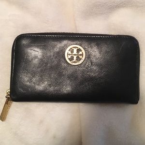 Tory Burch black leather and gold wallet.
