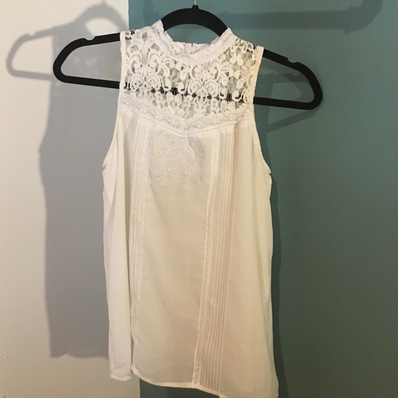 high neck sleeveless top with lace detailing