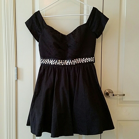 Elegant black dress with diamond stones