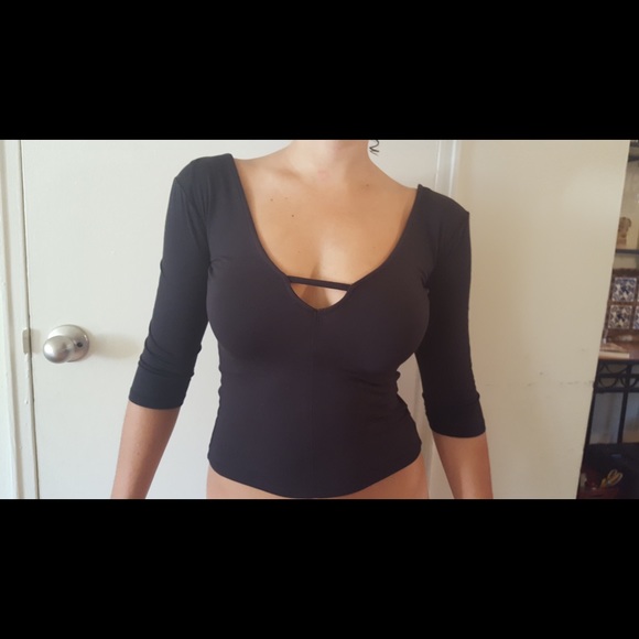 Black low cut top. Silence + noise