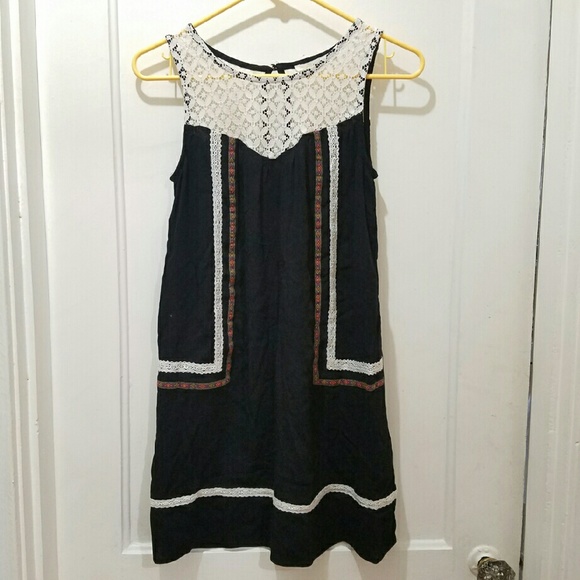 Black & lace dress with tribal detail