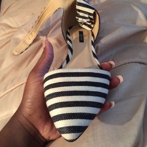 White and black striped shoes