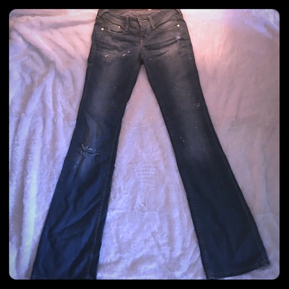 Distressed Bebe jeans. Never worn.