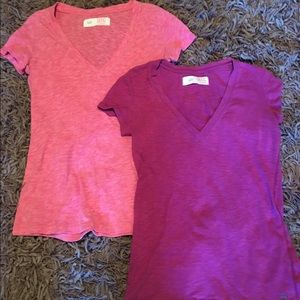 Two V cut tees bought from the store garage