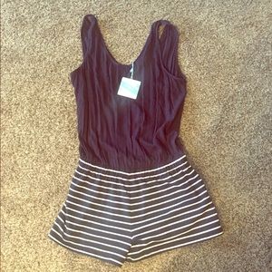Umgee Romper. Brand new. Never worn.