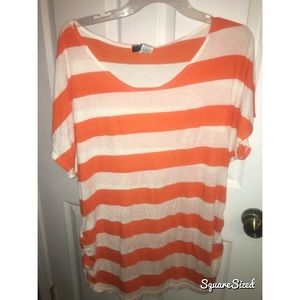 White and orange stripped shirt