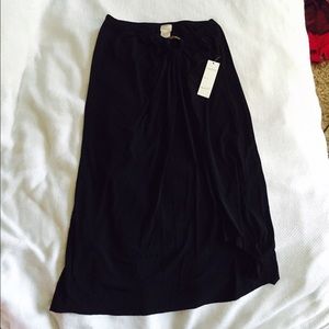 Asymmetrical black stretch skirt