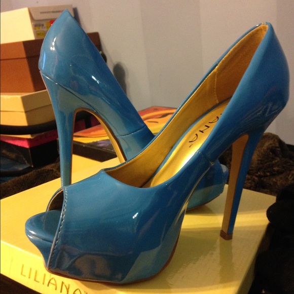 Blue patent leather platform peep toe heels