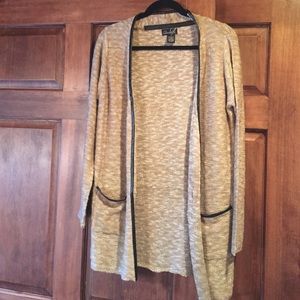 Cream and leather cardigan.