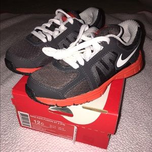 Brand new Nike Boys Fusion shoes. Size 12c