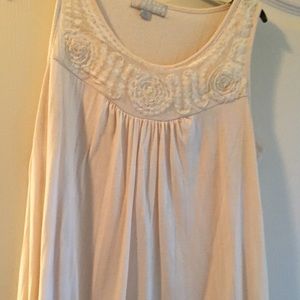 Fancy cream colored sleeveless shirt