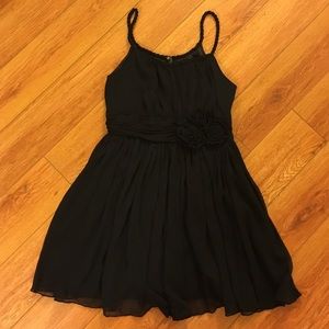 Black short dress with a floral waistband