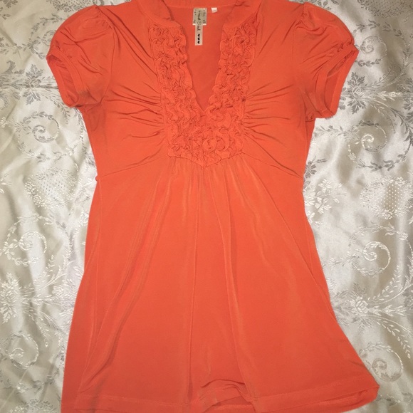 Orange ruffled top