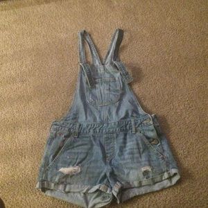Denim distressed overalls