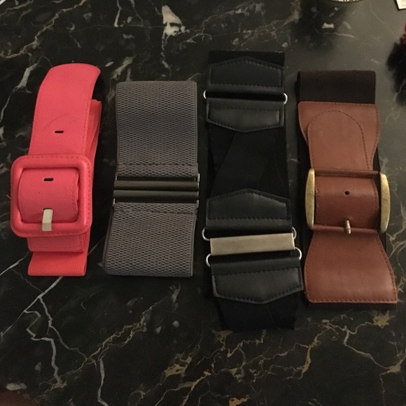 Lot of high-waisted wide fabric stretchy belts