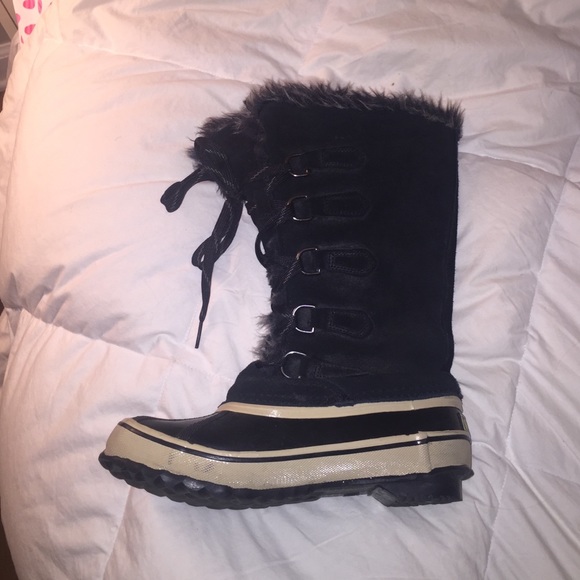 Tall black furry winter boots