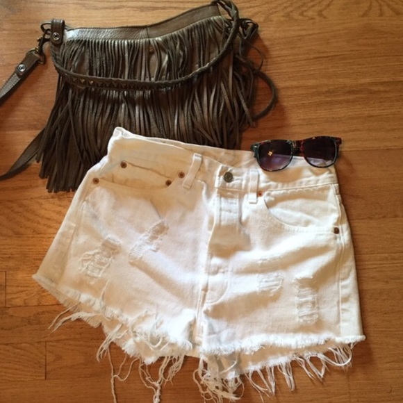 White distressed Levi shorts