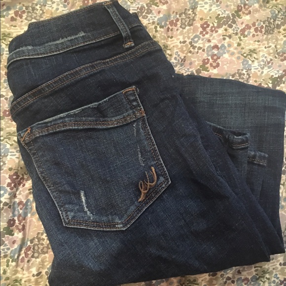 Dark wash destroyed express jegging size 4