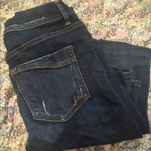 Dark wash destroyed express jegging size 4