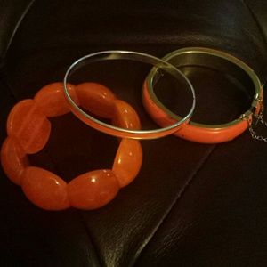 3 orange bracelets