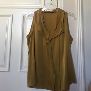 Ellie Tahari. 95% Silk. Gold blouse. Size Large.