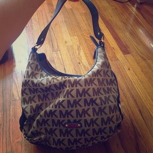 Michael Kors, with blue lining.