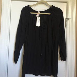 Cute black peasant top. Gauze-like material.