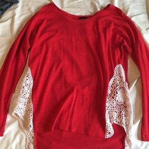 Red long sleeved shirt with lace detail