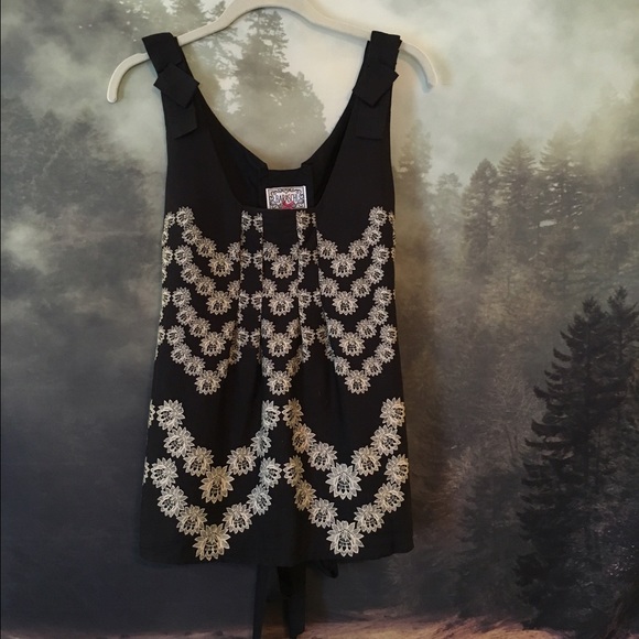 Silk pleated bow shoulder blouse