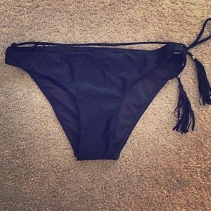 Black swimsuit bikini bottoms with fringe