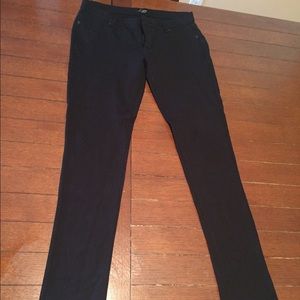 Black pants, stretchy skinny fit.