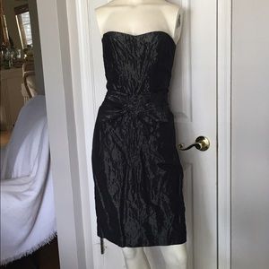 Dress: Nicole Miller Collection