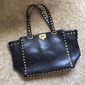Black tote with gold studded detail