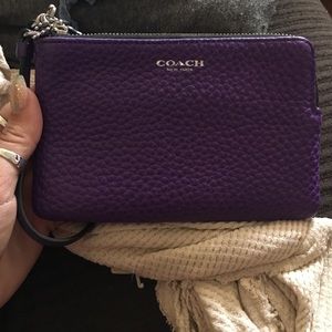 Purple pebbled leather coach wristlet