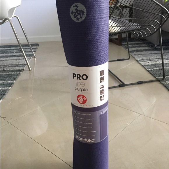 Purple Manduka yoga mat