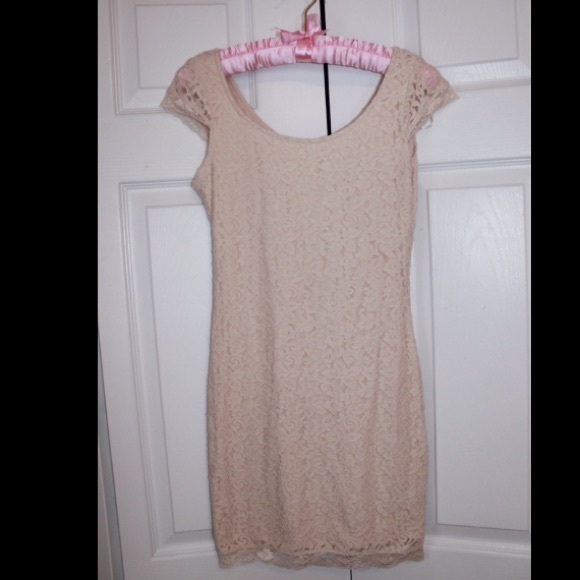 Nude colored lace body-con dress