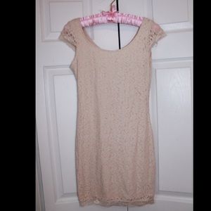 Nude colored lace body-con dress
