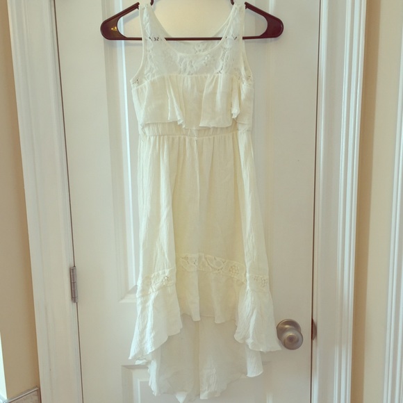 White linen type dress longer in the back