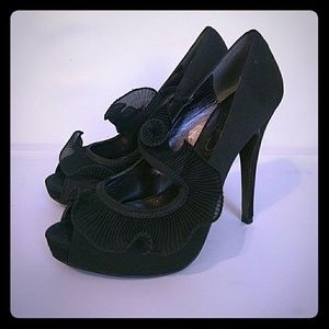 Ruffled peep-toe satin pumps