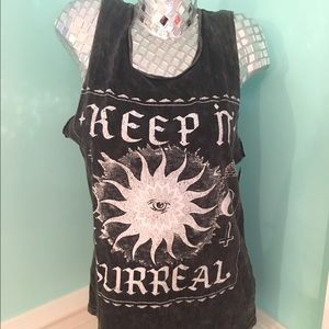 Black Tank reads: KEEP IT SURREAL