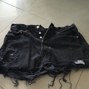 One of a kind black Levi high wasted shorts.